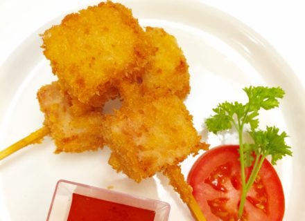 Ham tempura served with sweet and sour sauce.